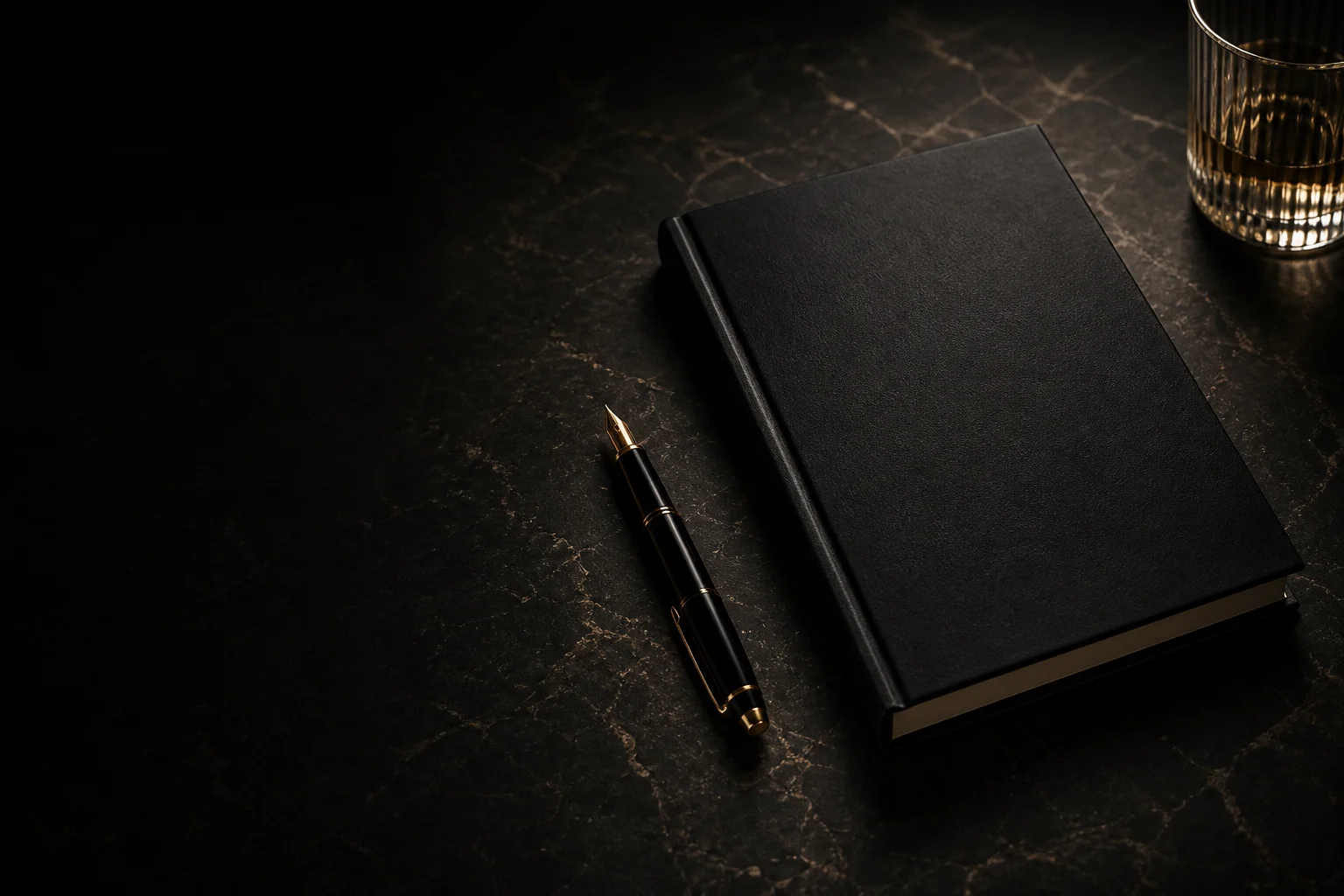 Closed black prospectus book on a dark editorial desk